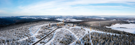 Fichtelberg highest mountain in Erzgebirge in winter snow aerial view photo panorama in Oberwiesenthal, Germanyの写真素材