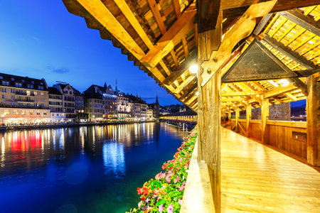 Lucerne Chapel Bridge KapellbrÃ¼cke city at Reuss river at twilight traveling in Switzerlandの写真素材