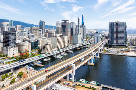 Kobe skyline from above with port and elevated road bridgeの写真素材