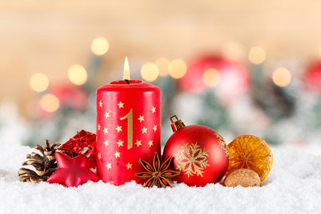 First 1st Sunday in advent with burning candle Christmas time decoration deco with copyspace copy spaceの写真素材