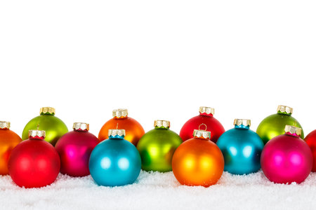 Christmas balls baubles in winter with copyspace copy space decoration deco isolated on a white backgroundの写真素材