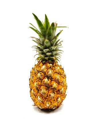 Single whole ripe pineapple fruit isolated on white backgroundの写真素材