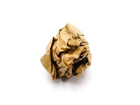 Crumpled brown paper is mauled on white blackgroundの写真素材