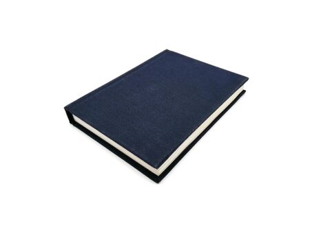 Dark blue book on white backgroundの写真素材