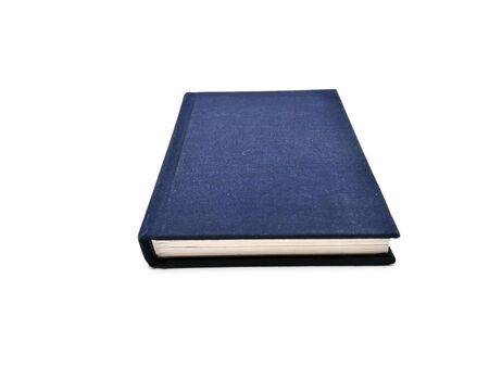 Dark blue book on white backgroundの写真素材