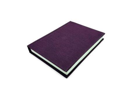 Dark blue book on white backgroundの写真素材