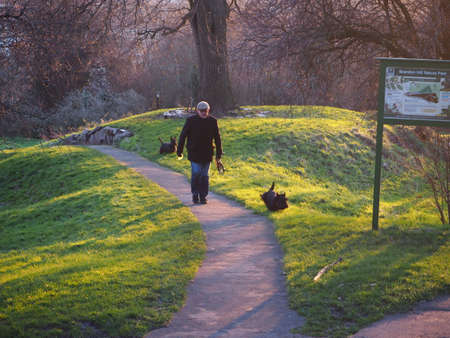 British with his little dogのeditorial素材