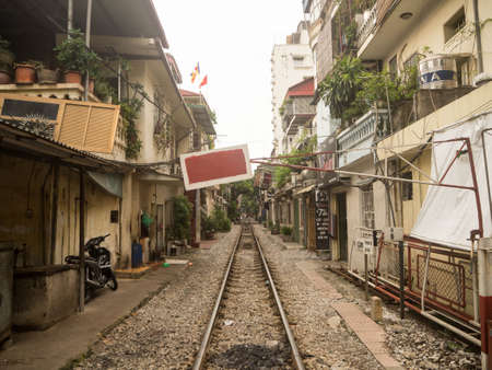 Local houses located close to active railway in Hanoi Old Quarter, Vietnam.のeditorial素材