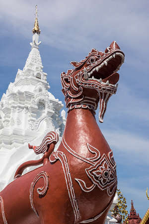 Leo statue  lion statue in Thai temple at wat  Prathat Hariphunchai, Thailand.