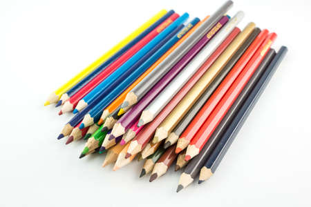 Stacking color pencil on white background.