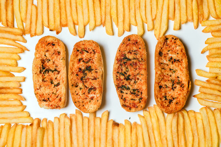 Top view of french fries on white background