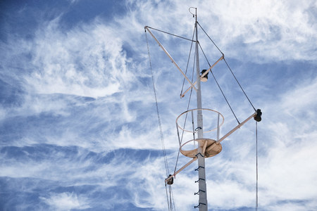 The mast of large wooden ship. Beautiful travel picture with masts and rigging of sailing ship...