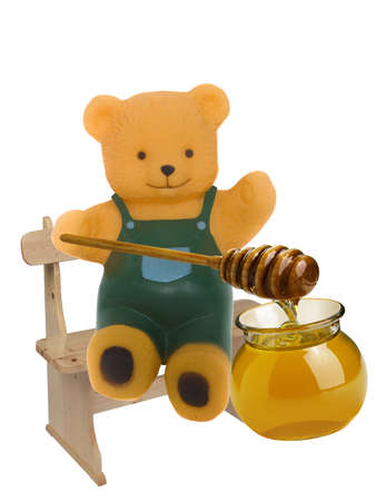 Bear eating honey の写真素材