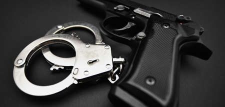 Gun and Handcuffs close-up