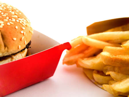 Burger and Fries in Cardboard Fast Unhealthy Food on White Backgroundの写真素材