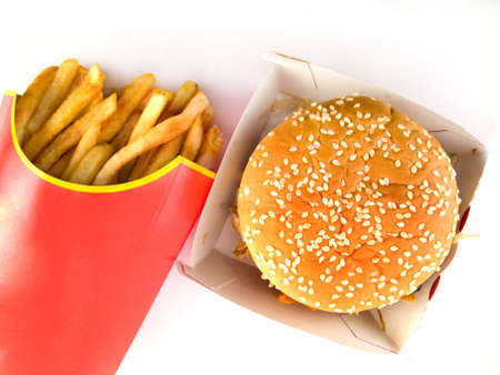 Burger and Fries in Cardboard Fast Unhealthy Food on White Background