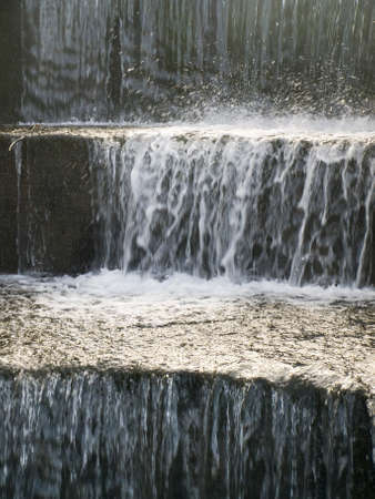Cold Water Flowing Down Stone Steps Clearの写真素材