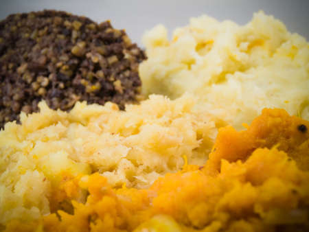 Haggis and Mash on white DOF on Vegの写真素材