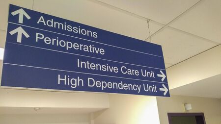 admissions and perioperative / ICU directions sign in a hospital in sydney australiaの写真素材