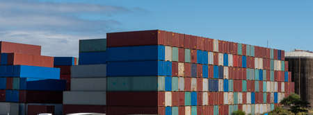 shipping container storage yard on a sunny dayの写真素材
