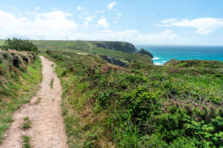 National Trust - Carnewas at Bedruthan cliff side hike summer timeの写真素材