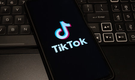 tiktok logo on mobile phone  , Sydney Australia July 30 2022のeditorial素材