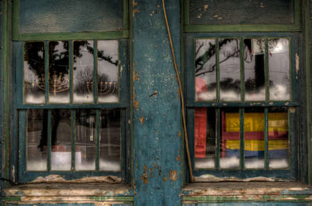 Old shop window decorated for Winter Holidaysのeditorial素材