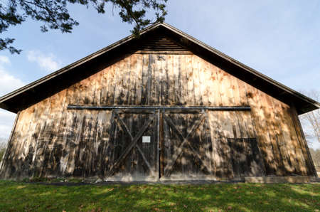 Exterior entrance of old worn barnのeditorial素材