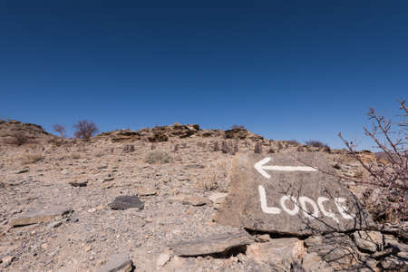 Hand Painted Trail Sign with Arrow, Namibia, Namibiaの写真素材