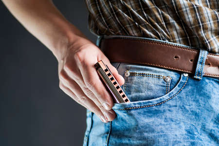 Blues harp in the pocket jeansの写真素材