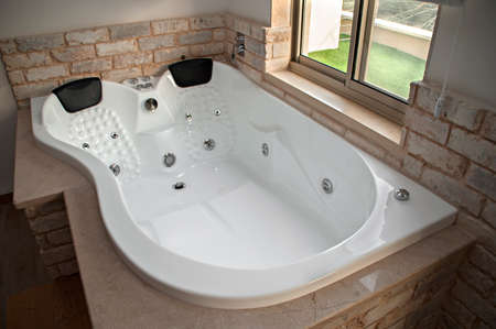 Private hot tub in the apartment for twoの写真素材