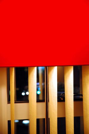 Red Lamp Standing by the window.の写真素材