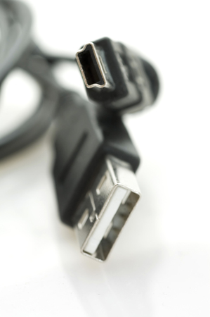 Close up view on USB connector on white background.