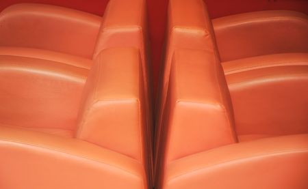 Interior of modern restaurant. Orange leather and luxury chairs.の写真素材