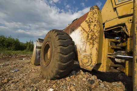 Old bulldozer on the municipal waiting next working day.