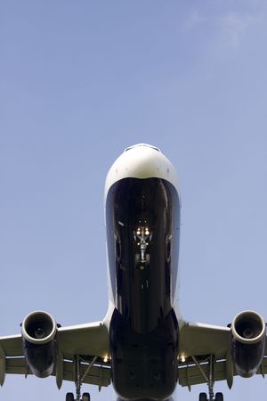 twin engine jet on approach to landの写真素材