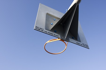 basketball hoop against a clear blue skyの写真素材