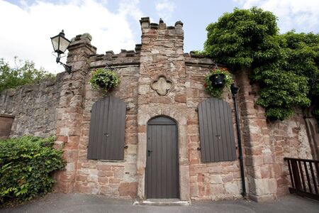 locked door and windows in English castleの写真素材