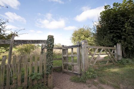 wooden gate on path of a country walkの写真素材