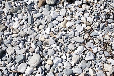 pebbles on a beach for use as a backgroundの写真素材