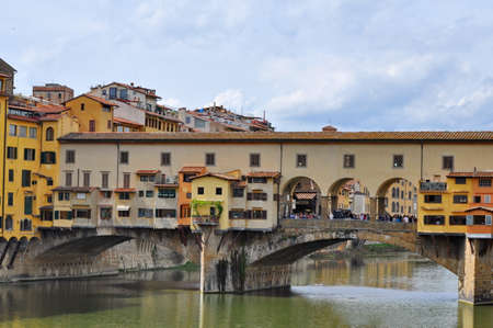 Ponte Vecchio over Arno river in Florence, Italyの写真素材