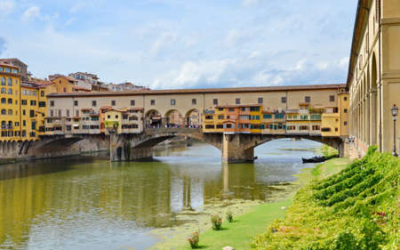 Ponte Vecchio over Arno river in Florence, Italyの写真素材