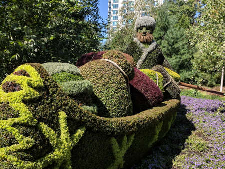 MosaiCulture 2018, Jacques Cartier Park, Gatineau, Quebec, Canada, 09/13/2018: The Vogayeur, one of the 45 horticultural masterpieces showcased at Jacques-Cartier Park in Gatineau.のeditorial素材