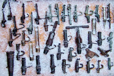 Homemade carved wooden spiles used to tap maple trees