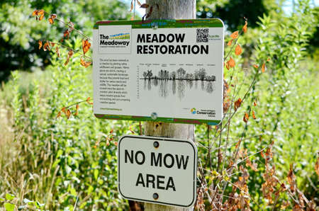 Scarborough, Ontario, Canada, August 1, 2020: Meadow Restoration sign in The Meadoway in Scarborough, Ontario. The Meadoway is transforming a hydro corridor into a vibrant 16-kilometre stretch of urbaのeditorial素材