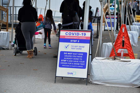 Scarborough, Ontario, Canada, September 29, 2020: People wait in line for a Covid-19 test at the...