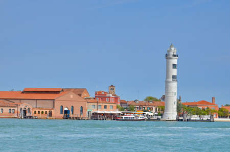 Murano Island in Venice with its beautiful lighthouse in Italy.の写真素材