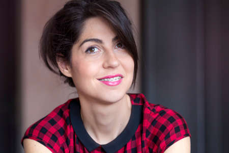 Portrait of a beautiful woman with braces on teeth. Orthodontic Treatment. Dental care Conceptの写真素材