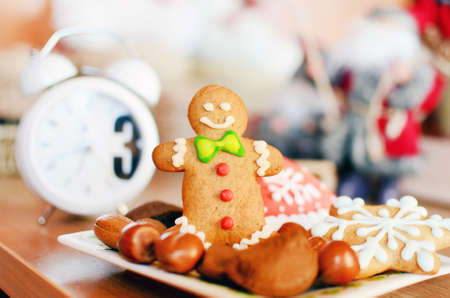 Smiling gingerbread man and christmas  cookies for christmasの写真素材
