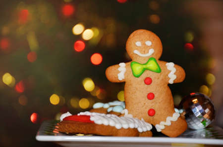 Smiling gingerbread man and christmas  cookies for christmasの写真素材